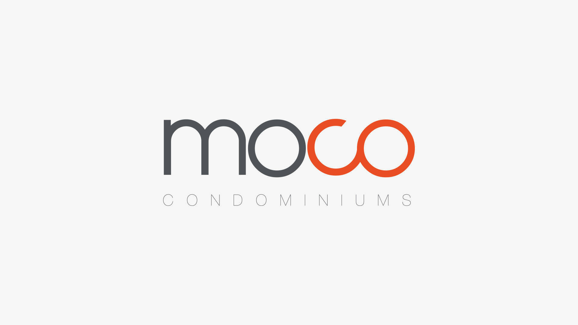 logo. moco condominiums.